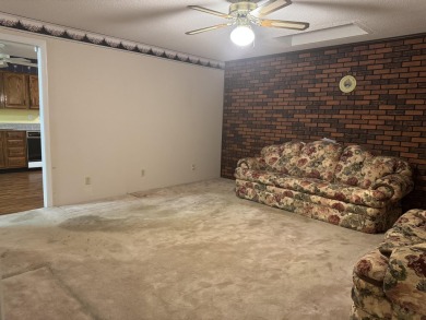 Beautiful brick home with four bedrooms, living room