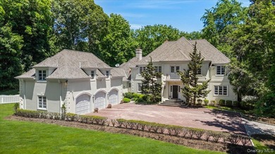 Timeless Lloyd Harbor Estate with Resort-Style Amenities. Set on - photo 1