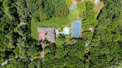 Timeless Lloyd Harbor Estate with Resort-Style Amenities. Set on - photo 2