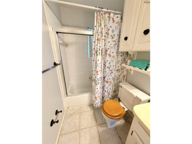 Charming 3-bedroom, 1.5-bath home with Pergo wood and tile - photo 22