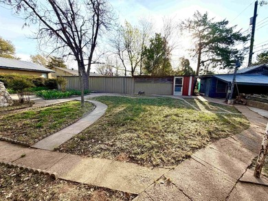 Charming 3-bedroom, 1.5-bath home with Pergo wood and tile - photo 29