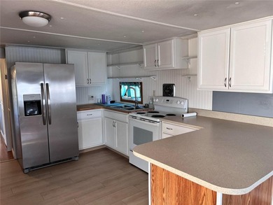 A charming mobile home located in an all ages park at 207 51st - photo 7