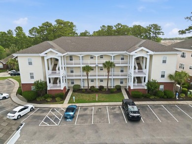 Welcome to this updated 3-bedroom, 2-bath end-unit condo in The - photo 1