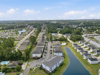 Welcome to this updated 3-bedroom, 2-bath end-unit condo in The - photo 2