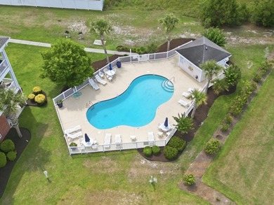 Welcome to this updated 3-bedroom, 2-bath end-unit condo in The - photo 4