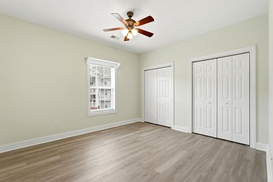 Welcome to this updated 3-bedroom, 2-bath end-unit condo in The - photo 6