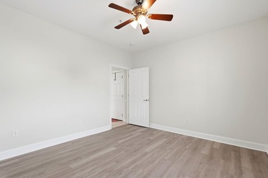 Welcome to this updated 3-bedroom, 2-bath end-unit condo in The - photo 7