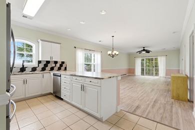 Welcome to this updated 3-bedroom, 2-bath end-unit condo in The - photo 8