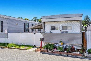 Welcome to this beautifully maintained 2-bedroom, 1-bath mobile - photo 2