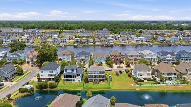 Welcome to luxury coastal living in the highly sought-after - photo 3
