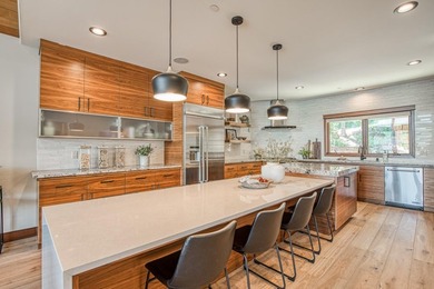 Experience sophisticated lakefront living in this striking - photo 11