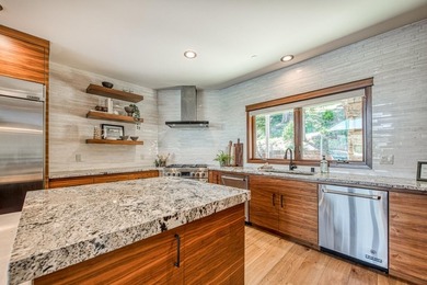 Experience sophisticated lakefront living in this striking - photo 12