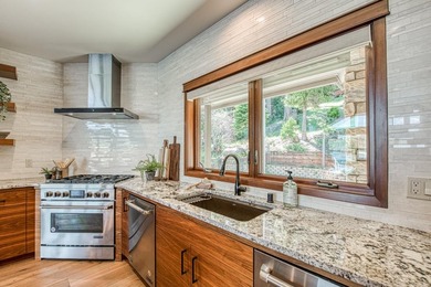 Experience sophisticated lakefront living in this striking - photo 13