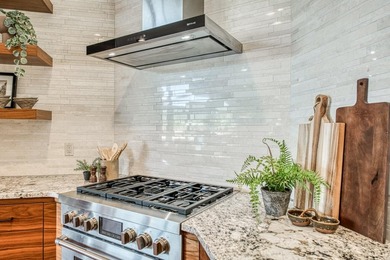 Experience sophisticated lakefront living in this striking - photo 14
