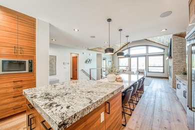 Experience sophisticated lakefront living in this striking - photo 16