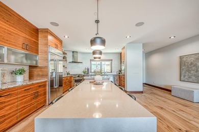 Experience sophisticated lakefront living in this striking - photo 19