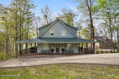 Lakefront views and timeless craftsmanship define this - photo 5