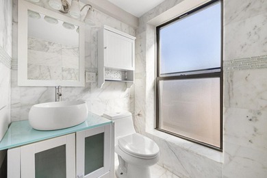 A rare opportunity to acquire a renovated three-family townhouse - photo 6
