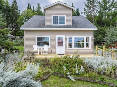 Enjoy this adorable home situated in the Heart of the Northwoods - photo 2