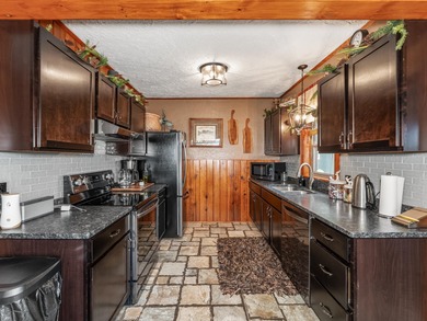Enjoy this adorable home situated in the Heart of the Northwoods - photo 3