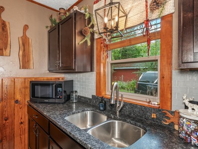 Enjoy this adorable home situated in the Heart of the Northwoods - photo 4