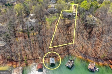 Situated on DEEP WATER,tucked away on nearly an acre along the - photo 2