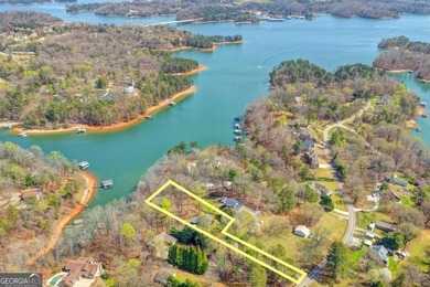 Situated on DEEP WATER,tucked away on nearly an acre along the - photo 3