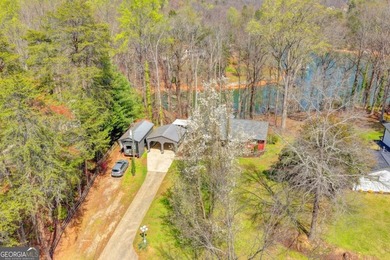 Situated on DEEP WATER,tucked away on nearly an acre along the - photo 5