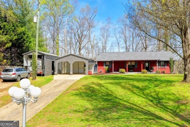Situated on DEEP WATER,tucked away on nearly an acre along the - photo 6