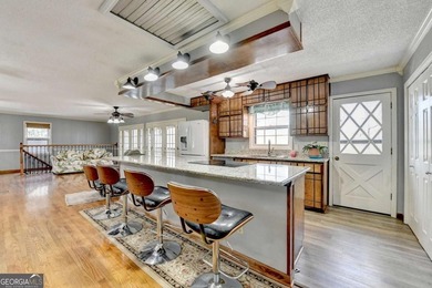 Situated on DEEP WATER,tucked away on nearly an acre along the - photo 9