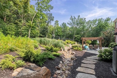 Welcome to this custom-built colonial home in the prestigious