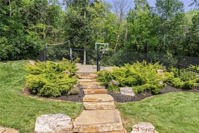 Welcome to this custom-built colonial home in the prestigious