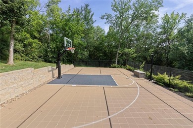 Welcome to this custom-built colonial home in the prestigious