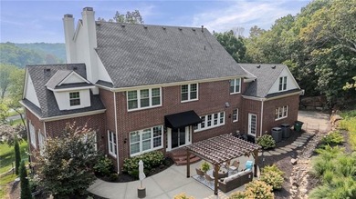 Welcome to this custom-built colonial home in the prestigious