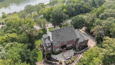 Welcome to this custom-built colonial home in the prestigious