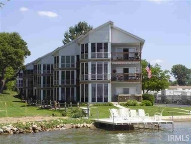 MOVE-IN READY CONDO ON WAWASEE LAKEFRONT IN ONE OF THE MOST COST - photo 29