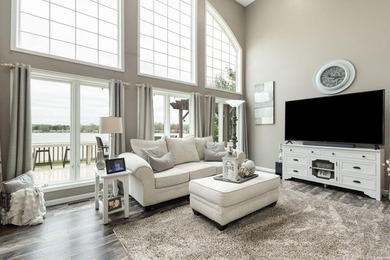 Welcome Home to this stunning lakefront retreat on beautiful - photo 3