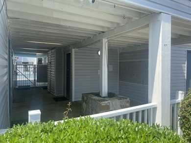 Welcome to Finisterra Condominiums, a gated waterfront community - photo 14