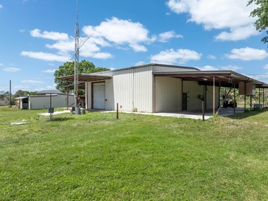 This Rare 5-acre parcel, is an exceptional opportunity for hobby - photo 1