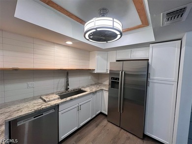 Welcome to this beautifully updated condo in the heart of Cape - photo 3