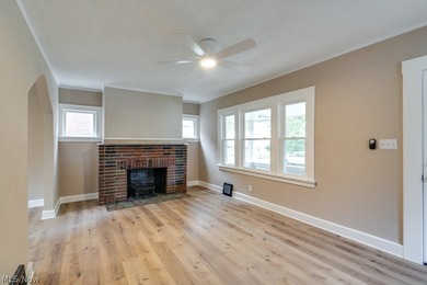 Move-in ready with extensive updates! New windows, flooring - photo 4