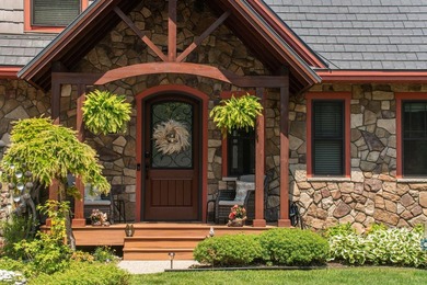 Experience exceptional lakefront living with 100 feet of - photo 11
