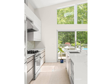 Recently transformed with a stylish new renovation, this - photo 12