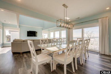 Built in 2021 and impeccably maintained, this luxury soundfront