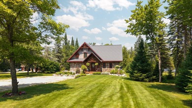 Experience exceptional lakefront living with 100 feet of - photo 12