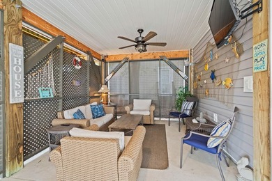 This spacious 3 Bedroom 2.5 Bath raised 1.5 story beach house is - photo 3