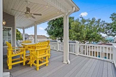 This spacious 3 Bedroom 2.5 Bath raised 1.5 story beach house is - photo 4