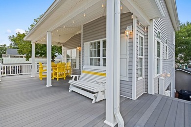 This spacious 3 Bedroom 2.5 Bath raised 1.5 story beach house is - photo 6