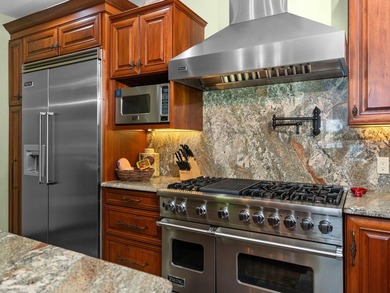 Experience exceptional lakefront living with 100 feet of - photo 19
