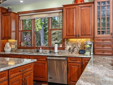 Experience exceptional lakefront living with 100 feet of - photo 20
